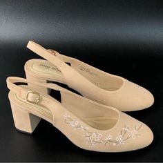 For Sale Brand New Condition Easy Street Dainty Women’s Slingback Heels. Easy Street Defines Feminine Elegance With These Lovely Dainty Heels. Conditions: Brand New Condition Size: 9w Color: Nude Suede Country/Region Of Manufacture: Imported Embroidered Floral Accents Block Heel Suede Upper Microsuede Lining Foam Midsole Tpr Outsole Round Toe Slip-On Slingback Pump Buckle Closure Padded Footbed Smoke And Pet Free Business. Please See The Photos Above My Listing For More Details. Colors May Vary Spring Evening Slingback Pumps With Almond Toe, Beige Almond Toe Slingback Pumps For Spring, Summer Almond Toe Slingback Pumps Medium Width, Spring Slingback Pumps With 4-inch Heel And Medium Width, Spring Slingback Sandals With 4-inch Heel And Almond Toe, Slingback Pumps With 4-inch Heel And Round Toe, Medium Width Slingback Pumps For Spring Evening, Medium Width Almond Toe Slingback Pumps For Spring, Spring Formal Slingback Pumps With Round Toe