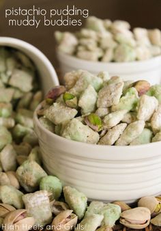 two white bowls filled with pistachio and almonds