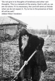 an old man with a long beard is holding a stick in his hand and looking at the ground