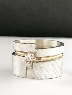 Happy Choices Stacking Rings by Dagmara Costello (Gold, Silver & Stone Ring) | Artful Home Contemporary Wedding Ring, Wide Band Engagement Ring Silver, Silver And Gold Rings Together, Wide Band Wedding Ring, Wide Band Diamond Rings, Modern Ring Design, Wide Diamond Bands, Silver Stone Ring, Inexpensive Jewelry