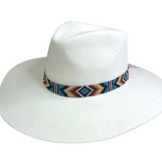 Multi Colored BeadsMeasures 13/16 Inch WideSouthwestern PatternStretch to Fit20 Inch Diameter*Hat not includedDress up your favorite hat with this beaded hatband.Stretch to fit in a southwestern pattern of multi colored beads. Beaded Hat Bands, Beaded Hat, Southwestern Patterns, Hat Band, Fit In, Panama Hat, Multi Colored, Cowboy Hats, Dress Up