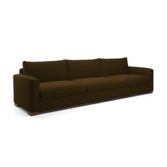 a brown couch sitting on top of a white floor