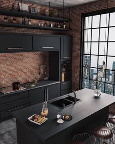 a kitchen with an island, sink and stove in it's center area next to a large window