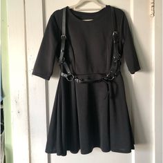 Nwot Black Doll Dress Super Cute I Didn’t Wear It , Just Tried When I Bought It (Got Pregnant And Now It Doesn’t Fit Me Unfortunately) Size Small Medium (No Tags) Polyester And Cotton Question? Comment Below Please I’ll Gladly Answer All Your Questions Black Doll Dress, Dress Harness, Navy Blue Cocktail Dress, Hoodie Sweater Dress, Harness Dress, Moon Dress, Jersey Wrap Dress, Midi Slip Dress, Blue Cocktail Dress