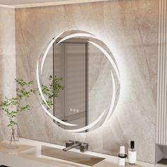 a bathroom with a sink, mirror and plants on the counter in front of it