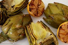 an artichoke is cut open and ready to be used as garnish