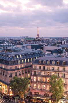 an aerial view of the city at dusk