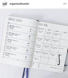 an open planner with the words workout schedule written on it