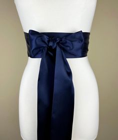 "Navy Blue Sash  Navy Satin Sash  Extra Long Navy Sash  Waistband Wrap  Obi Wrap Belt, Bow Belt  Bridesmaid Wedding Bridal Sash  Satin Swank  Make this Satin Swank® reversible waist sash the perfect finishing touch for your wedding, bridesmaid, or special occasion dress, or just the right piece to add instant polish to your dress or top.  This extra long version is 3.5 inches wide, 120 inches long, and will wrap around most waist sizes two times with a generous length remaining to tie in a bow or a simple knot with long-hanging tails.  Tie in front or in back.   This sash is a double layer of silky satin fabric in classic navy blue. Sash is the same front and back with ends finished on the angle and seams hidden within the fold lines. SIZING/COLOR/PRINT INFO: Sash Measurements: 3.5\" wide, Wedding Sash With Tie Back, Satin Bridal Belt For Bridesmaids, Satin Bridal Belt For Party, Satin Sash With Bow For Bridesmaids, Elegant Tie Back Sash For Formal Occasions, Fitted Satin Bow Sash For Bridesmaids, Elegant Tie Back Sashes For Formal Occasion, Elegant Satin Sash With Tie Back, Elegant Formal Sash With Tie Back