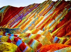 the colorful mountains are painted with different colors