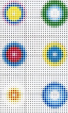 four different colored circles are arranged in the same pattern, and each has an individual dot