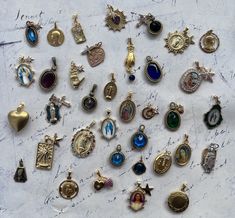 "Lovely Antique French Vintage Stylish Charms choose from 36 High end style Pendants French Dutch Belgian German gold plated handmade Beautiful Vintage Charms Pendants, rare selection all unique and in great condition, found in France, Belgium, Holland, Germany and Italy. The Star and the moon pendant also vintage holy mary pendants are gold plated and goldfilled! Beautiful glass Brass and antiqued metals too. The colored glass charms are beautifully facetted , real antiques... Unique rare and a Historical Reproduction Jewelry, Cheap Vintage Charm Medallion Jewelry, Victorian Jewelry Antique Yourgreatfinds ♥ Vintage Jewelry, Vintage Jewelry Yourgreatfinds ♥ Vintage Jewelry, Luxury Ornate Charms Jewelry, Luxury Vintage Charm Pendant Necklace, Luxury Vintage Heirloom Jewelry With Charm, Luxury Vintage Charm Jewelry For Collectors, Cheap Bohemian Jewelry With Vintage Charm