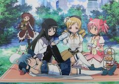 anime characters sitting on a blanket in the park