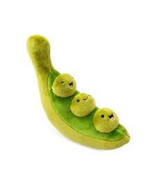 a stuffed banana with three peas in it