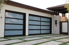 a house with two garage doors on the outside