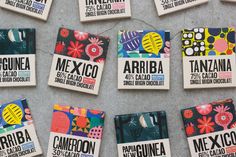 many different types of chocolates are on the ground with words written in spanish and english