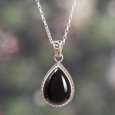 Unleash your inner elegance with this enchanting pendant necklace featuring a stunning teardrop black onyx stone. This exquisite accessory presented by India's Alok Jain is crafted from sterling silver and finished with a unique combination technique, ensuring a timeless accessory that exudes sophistication and grace. Spiritual Teardrop Jewelry For Formal Occasions, Formal Spiritual Teardrop Jewelry, Sterling Silver Teardrop Pendant Jewelry, Spiritual Teardrop Necklace For Formal Occasions, Classic Teardrop Gemstone Pendant Jewelry, Classic Teardrop Gemstone Necklace, Formal Spiritual Teardrop Necklace, Classic Sterling Silver Drop Necklace With Teardrop Pendant, Sterling Silver Teardrop Necklace With Polished Finish