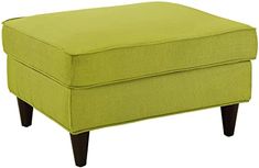 a lime green ottoman with wooden legs