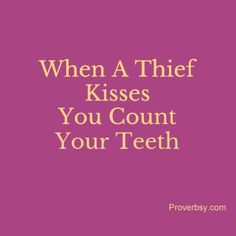 a pink background with the words when a thief kisses you count your teeth on it