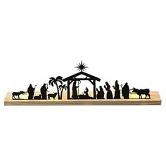 a nativity scene with the birth of jesus in silhouette on a wooden stand, against a white background