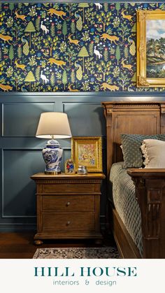 a bed room with a neatly made bed and a painting on the wall