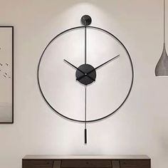 a large clock mounted to the side of a wall