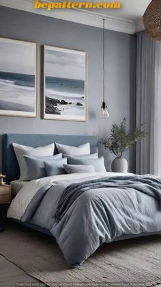 a bedroom with grey walls and two pictures on the wall above the bed, along with a plant