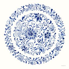 a blue and white floral design in the middle of a circular pattern on a white background