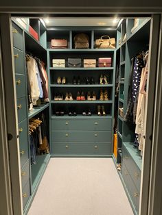 a walk in closet filled with lots of drawers and shoes on top of it's shelves