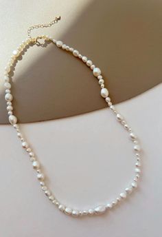 Indulge in the classic beauty of our Freshwater Pearl Necklace. Featuring pearls that boast a radiant glow and impeccable quality, this necklace is the epitome of elegance. Its versatile design makes it suitable for any occasion, from casual gatherings to formal events. Meticulously crafted, this piece promises to be a cherished addition to your jewelry collection." B Necklace, Marla Aaron, Pearl Necklace Handmade, Genuine Pearl Necklace, Handmade Beaded Necklace, Jewelry Polymer Clay, Model Woman, Electroformed Jewelry, Handmade Beaded Necklaces