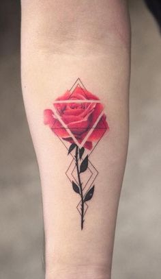 a red rose tattoo on the left inner arm and leg, with an arrow in the middle