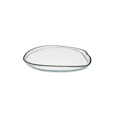 an oval glass plate with black rim on a white background, the bowl is empty and ready to be used as a serving dish