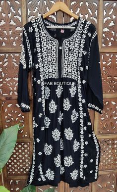 Description ▪ Kurti Fabric: Modal ▪ Kurti Length: 45-47 Inches ▪ Sleeves: 3/4 Sleeves ▪ Occasions: Party Wear, Office Wear, Festive Wear ▪ Garment Care: Hand Wash Only ▪ Price Includes: 1x Kurti Floral Embroidered Mulmul Sharara For Festivals, Bohemian Cutdana Sharara For Eid, Bohemian Chanderi Kurta With Cutdana, Designer Bohemian Kurta With Zari Work, Floral Embroidery Kurta For Festive Occasions, Bohemian Long Sleeve Anarkali Set With Zari Work, Bohemian Kurta With Zari Work For Designer Wear, Bohemian Anarkali Set With Floral Embroidery For Diwali, Traditional Anarkali Set With Floral Embroidery For Eid