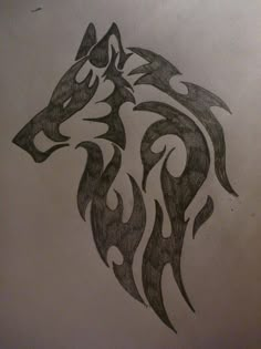 a drawing of a wolf's head with flames coming out of the back side