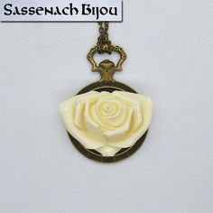 This is a large pocket watch style bronze pendant holding a resin white rose. Inspired by the Jacobite movement and the "White Roses of Scotland". It comes with a bronze link chain with lobster clasp. Choose your length. Pendant has a diameter of 45 mm / 2 inches and it's very heavy. Please, check the picture of the item in my hand for size reference. Objects do appear to be bigger than they are in such close-up. I take my pictures under natural light and add no enhancement effects on Photoshop Pocket Watch, Reference Objects, Watch Pendant, Bronze Pendant, White Rose, White Roses, Natural Light, Lobster Clasp, Jewelry Necklace Pendant