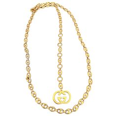 Gucci 1970's Gold Tone Mariner Link Chain Belt Size: 38 - 42 Length: 44.5" Width of pendant: 1.5" x 1" Gold-tone Necklace With Logo Charm For Formal Events, Gold-tone Chain Link Jewelry With Logo Charm, Luxury Chain Link Necklaces With Logo Charm, Formal Gold-tone Necklace With Logo Charm, Formal Gold Chain Necklace With Logo Charm, Classic Gold Chain Necklace With Logo Charm, Vintage Gold Gucci Jewelry, Vintage Gucci Gold Jewelry, Gucci Chain Jewelry For Gift