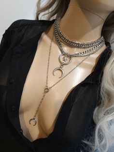 This handmade chunky stainless steel chain layered necklace set is a stunning piece of jewelry that is perfect for those who love bold and edgy accessories. The necklace features two necklaces, one thick chunky cover in an adjustable length, and a 4-strand drop festoon design, adding depth and dimension to the piece with a shiny Fang or cat's claw pendant.  The chunky chain is made of sturdy stainless steel, ensuring its durability and longevity.  This necklace set is an excellent handmade gift for someone special. It is a perfect choice for those who love alternative and goth styles, as well as anyone who wants to make a statement with their jewelry. It runs from 15 to 18 inches in length with a built-in extender. The necklace is waterproof and sweatproof and will never tarnish or fade! 2 Chain Layered Necklace, Chain Necklace Set, Goth Necklace, Chunky Choker, Edgy Accessories, Edgy Jewelry, Wolf Jewelry, Alternative Jewelry, Badass Style