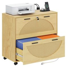 a wooden cabinet with two drawers and a printer on it's side, in front of a white background