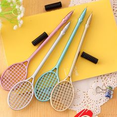 the holiday joy is happening on e - bay with four different colored tennis rackets