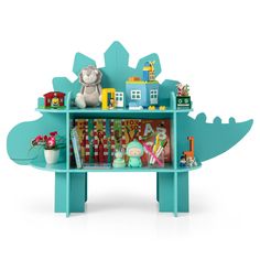 a blue dinosaur shelf with toys on it