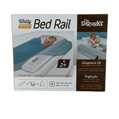 the bed rail box is open to show it's packaging