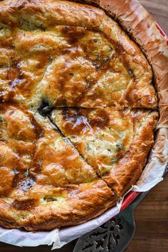 a pie sitting on top of a wooden table