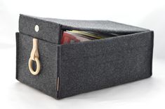 a black felt box with a pair of scissors in it