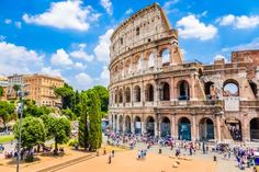 an aerial view of the colossion in rome, italy with people walking around