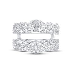 two white gold wedding bands with round diamonds on each band and one diamond in the middle