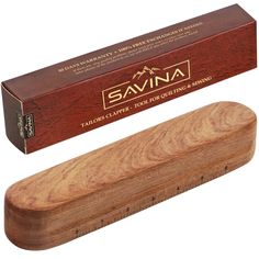 the savina sharpener is made from wood and has a wooden box on it