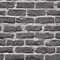 a black and white photo of a brick wall that has been made into a pattern