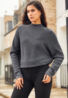 Indulge in the lightweight warmth and softness of the SoftBlend Merino Dolman Sweater. With its oversized fit, ribbed texture and wide dolman sleeves, it’s the epitome of chic meets comfort. A true wardrobe chameleon, it effortlessly transitions from daywear to evening grace. Loose, oversized fit, with dolman sleeves. 25½ inches from top of shoulder to hem (size S). Model wears size small. Merino wool blend (gray). 50% merino wool, 50% acrylic. Turn inside out, then machine was cold, gentle cycl Dolman Sweater, Ribbed Texture, Dolman Sleeve, Charcoal Grey, Oversized Fits, Merino Wool, Wool Blend, Shirts Tops, Inside Out