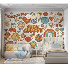 a bedroom with a bed, chair and wall mural on the walls that says stay grooy