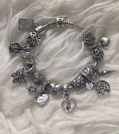 Dior Charm Bracelet, Aesthetic Pandora Charms, Aesthetic Pandora Bracelet, Pandora Charm Bracelet Ideas, Pandora Bracelet Ideas Inspiration, Pandora Charms Aesthetic, Pandora Charm Bracelet Aesthetic, Pandora Bracelet Aesthetic, Charm Bracelet Aesthetic